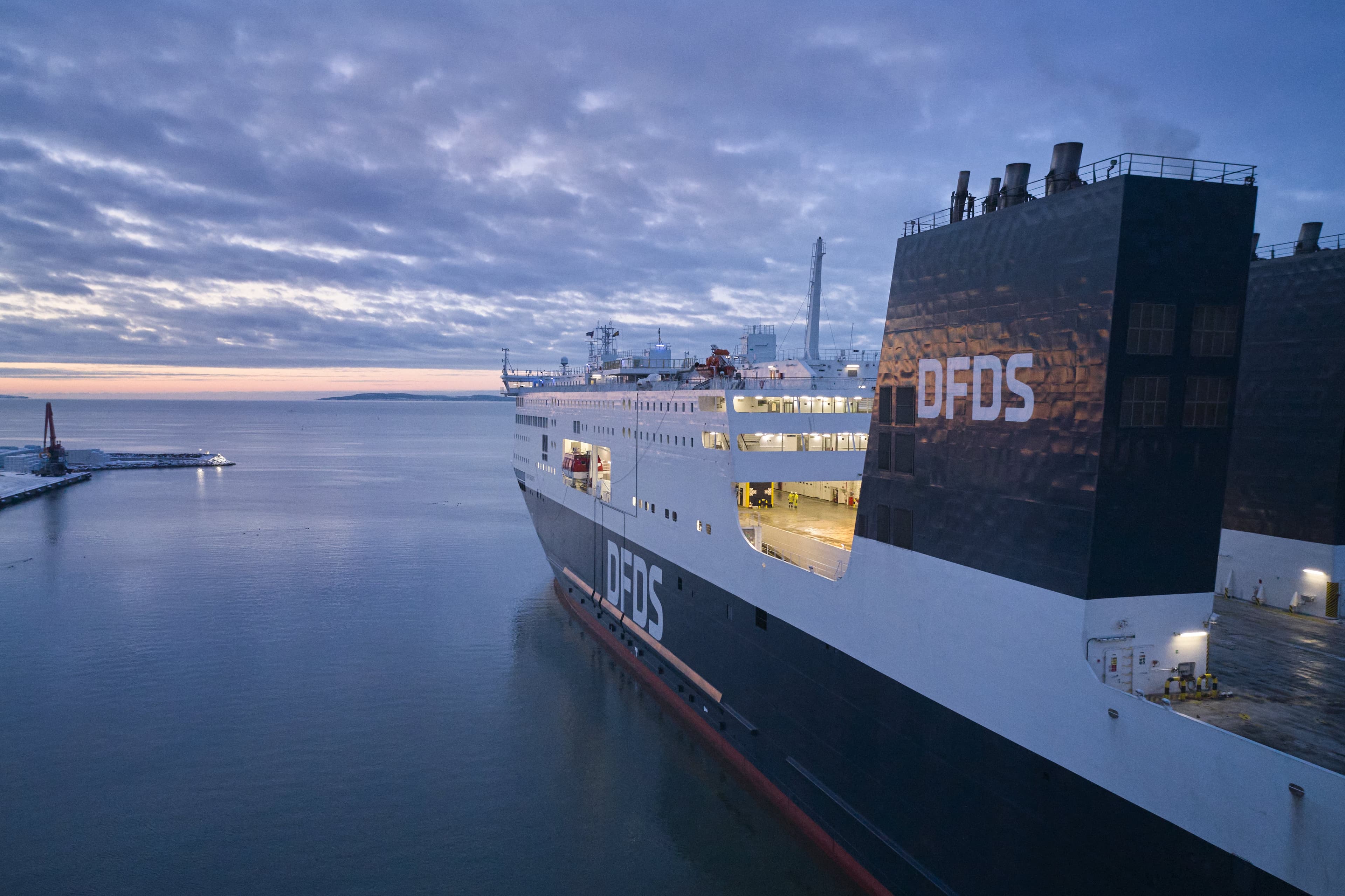 Vessel on the sea transporting containers.