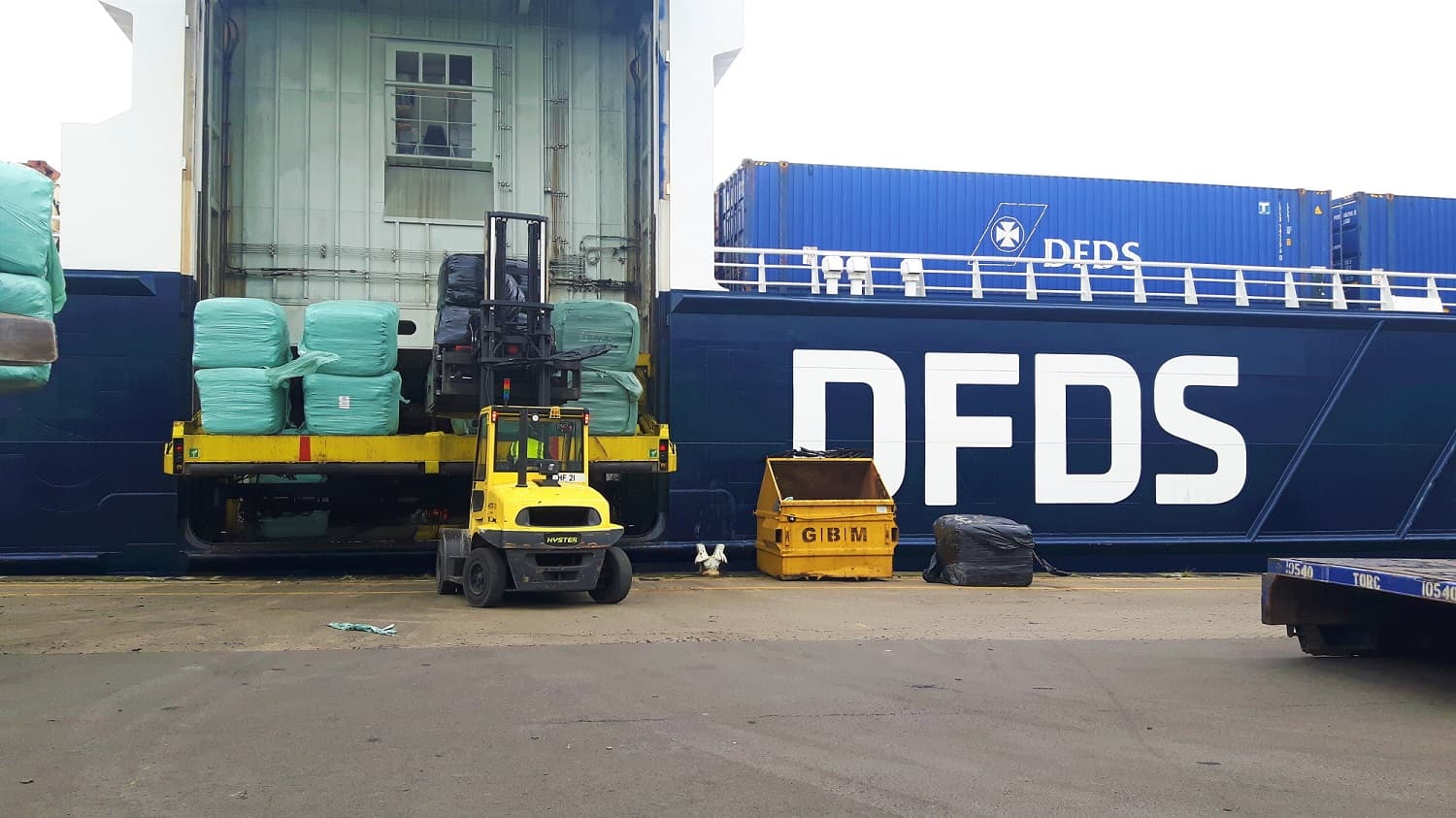 The side of a DFDS ro-ro vessel carrying refuse-derived fuel (RDF) cargo.